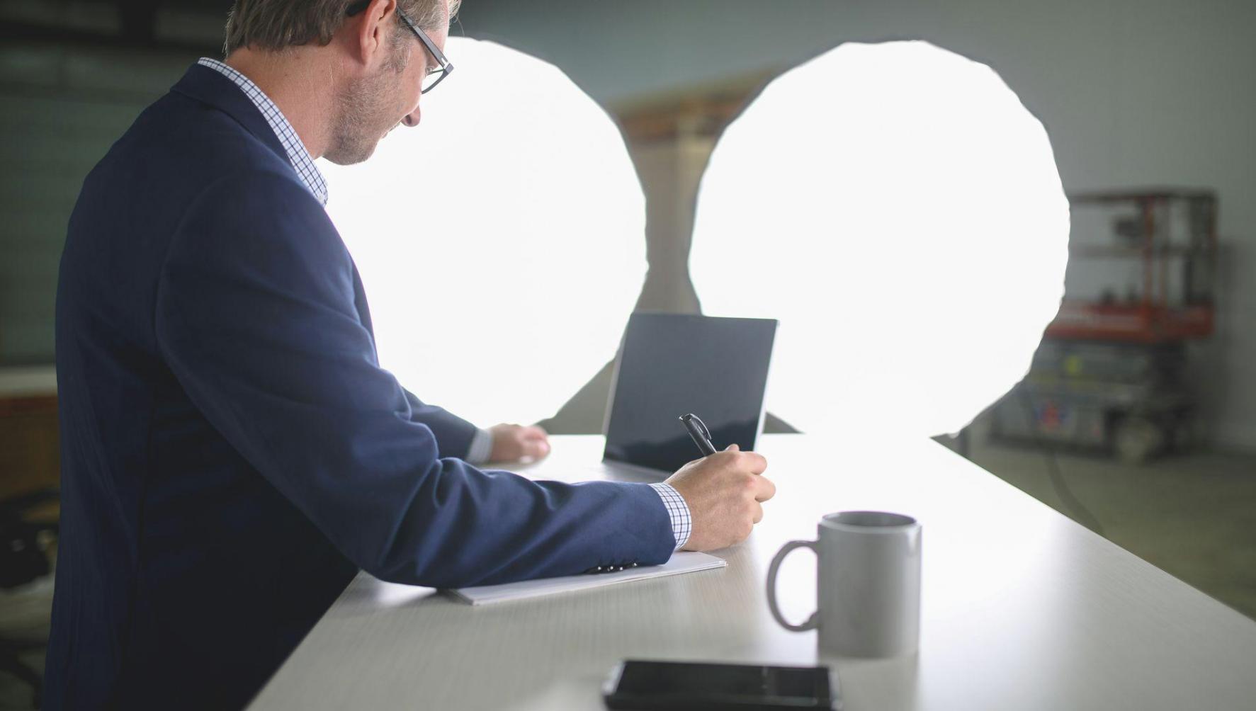 Professional reviewing financial charts and business metrics