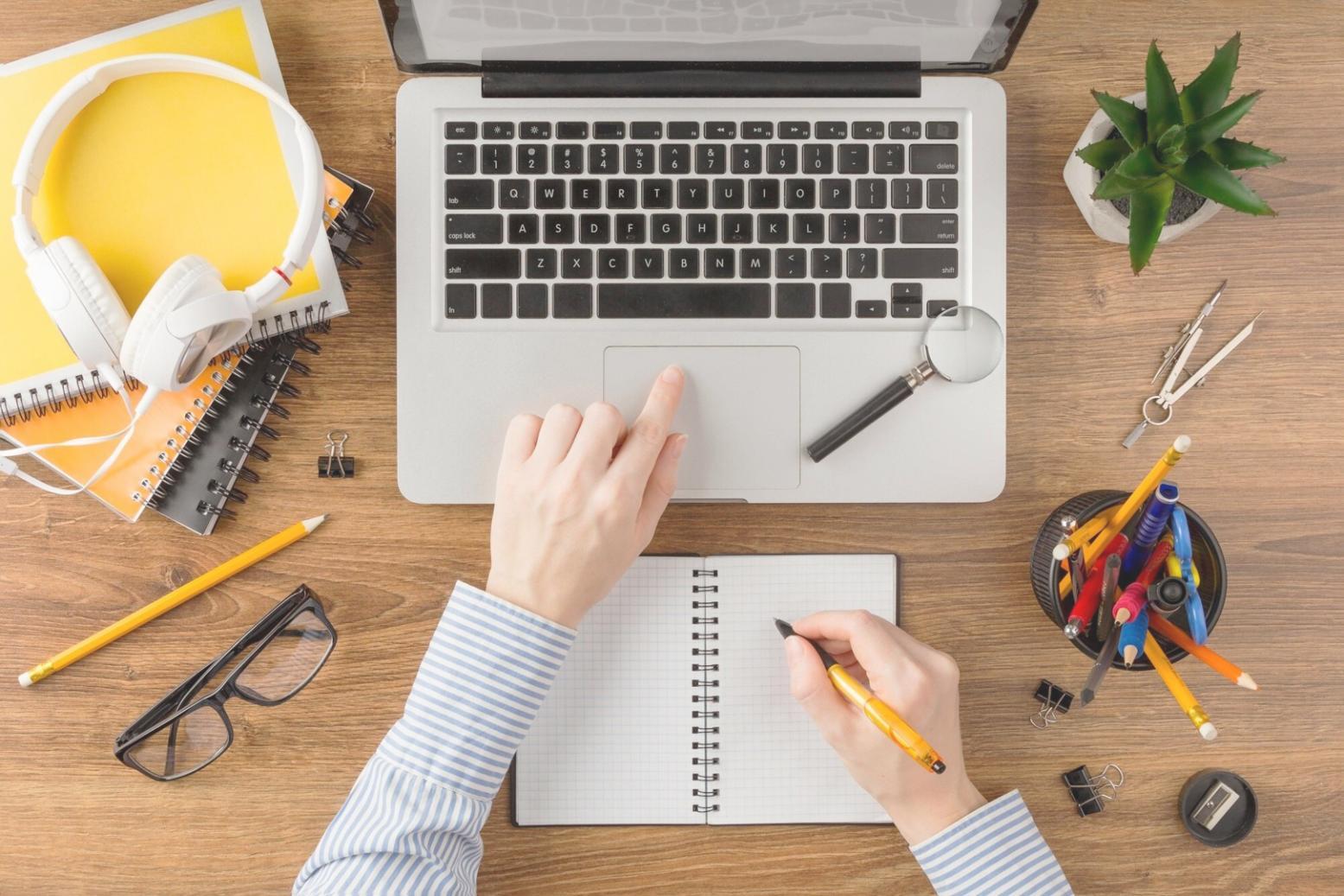 Business professionals analyzing strategic planning documents and charts during workshop session